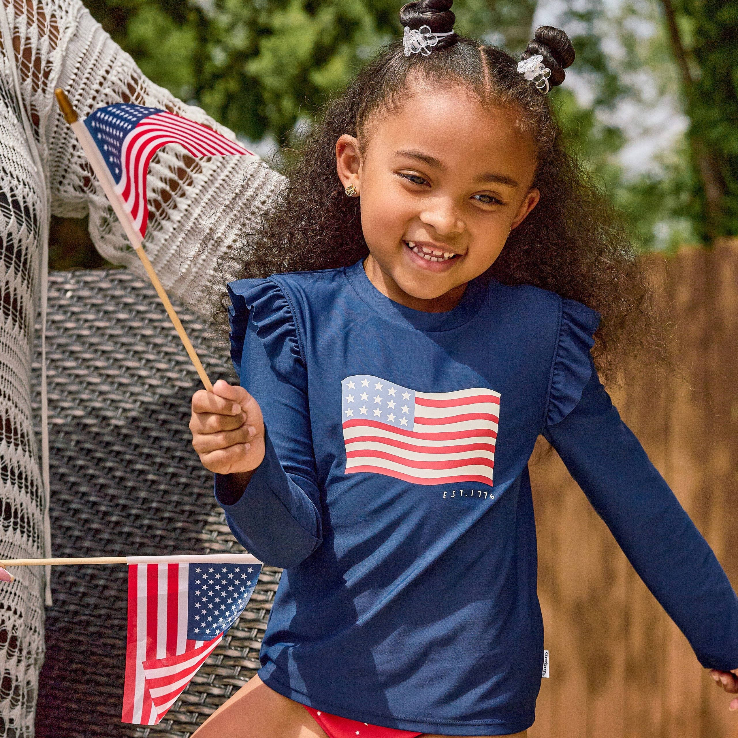 2-Piece Infant & Toddler Girls UPF 50+ USA Flag Rash Guard and Swim Bottoms Set - Image 2